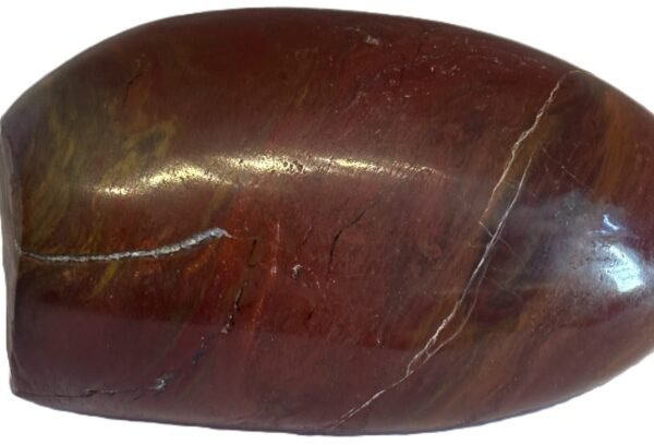 Polished carnelian standing freeform specimen5 3 sians emporium Close up of a glossy reddish brown polished stone with a light white vein running across it